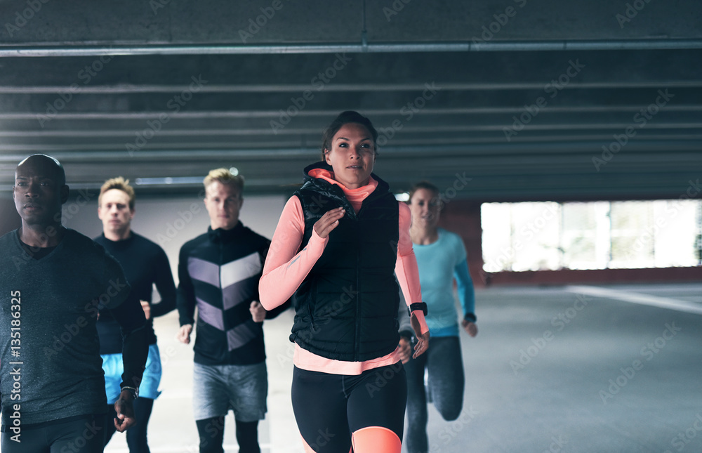 Runners practicing inside the building