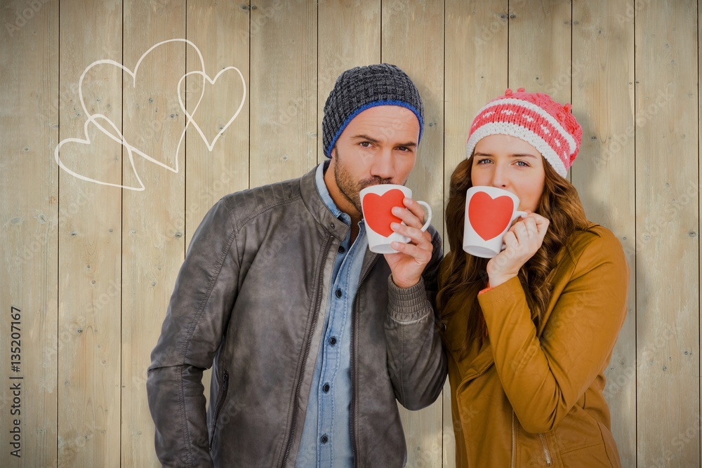 Composite image of portrait of young couple having coffee