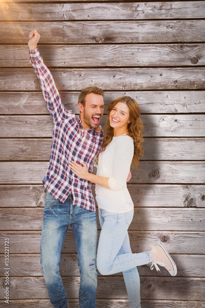 Composite image of young couple embracing and posing