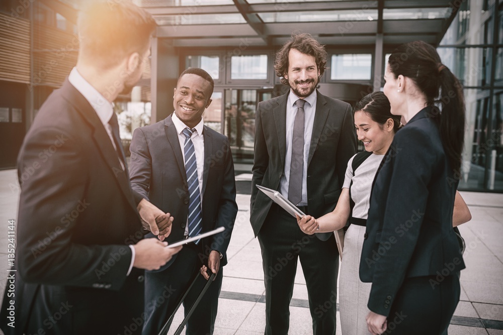 Group of businesspeople having conversation