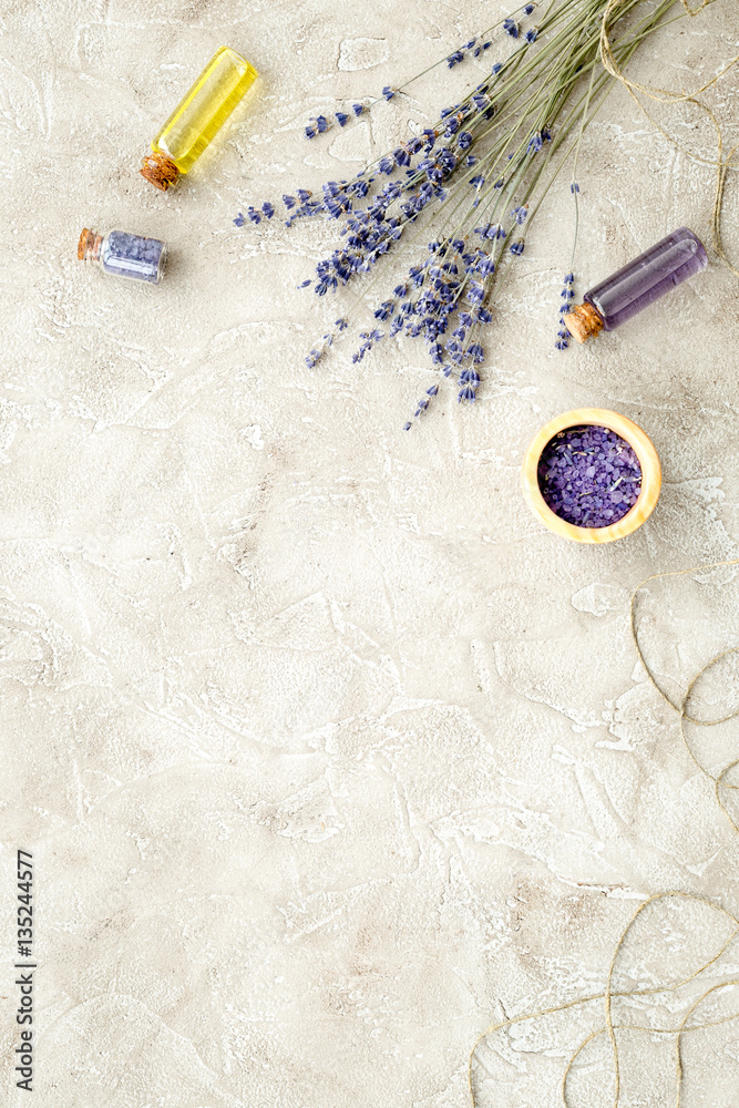 Essential oil and lavender salt with flowers top view