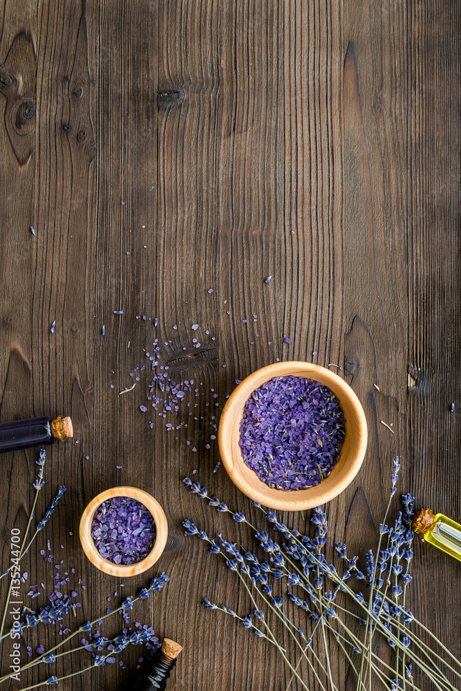 organic cosmetics with lavender on wooden background top view