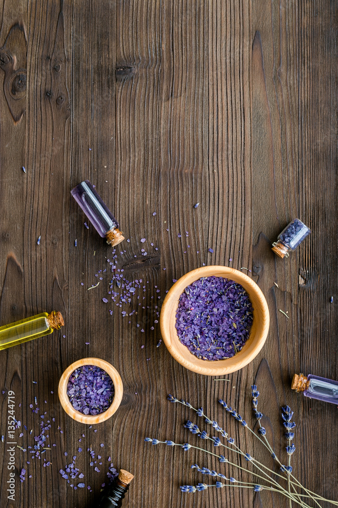 organic cosmetics with lavender on wooden background top view