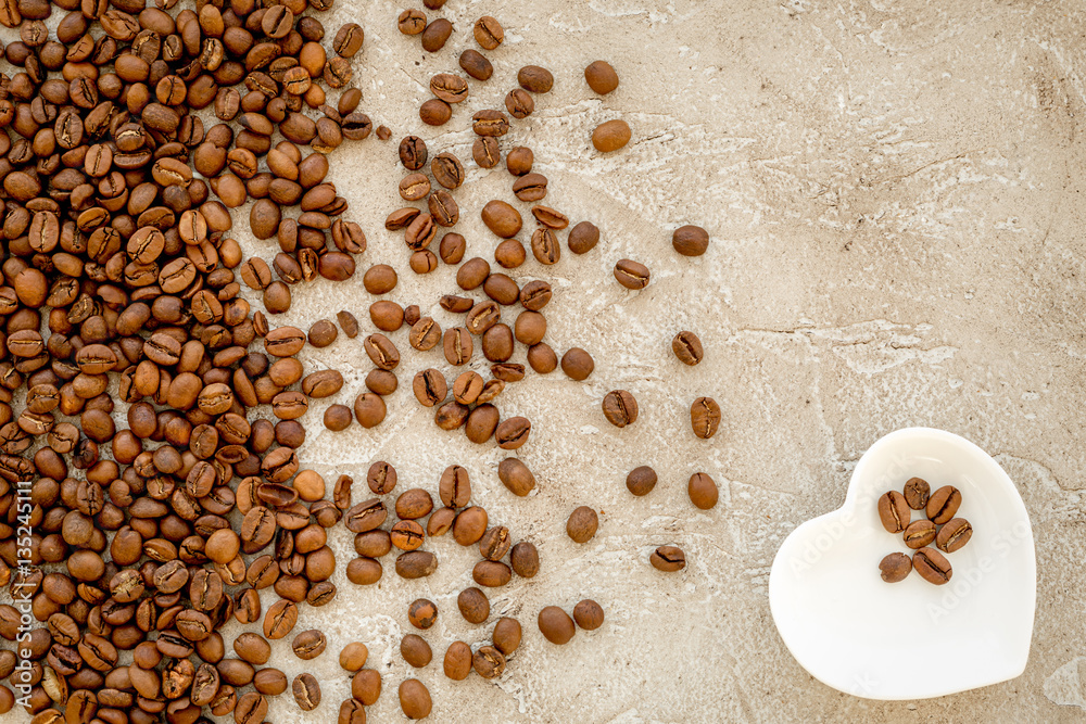 coffee beans on gray table top view