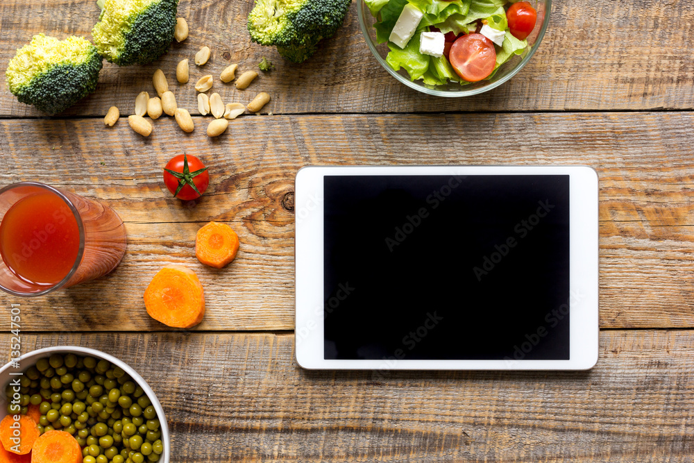 concept diet and tablet with vegetables mock up