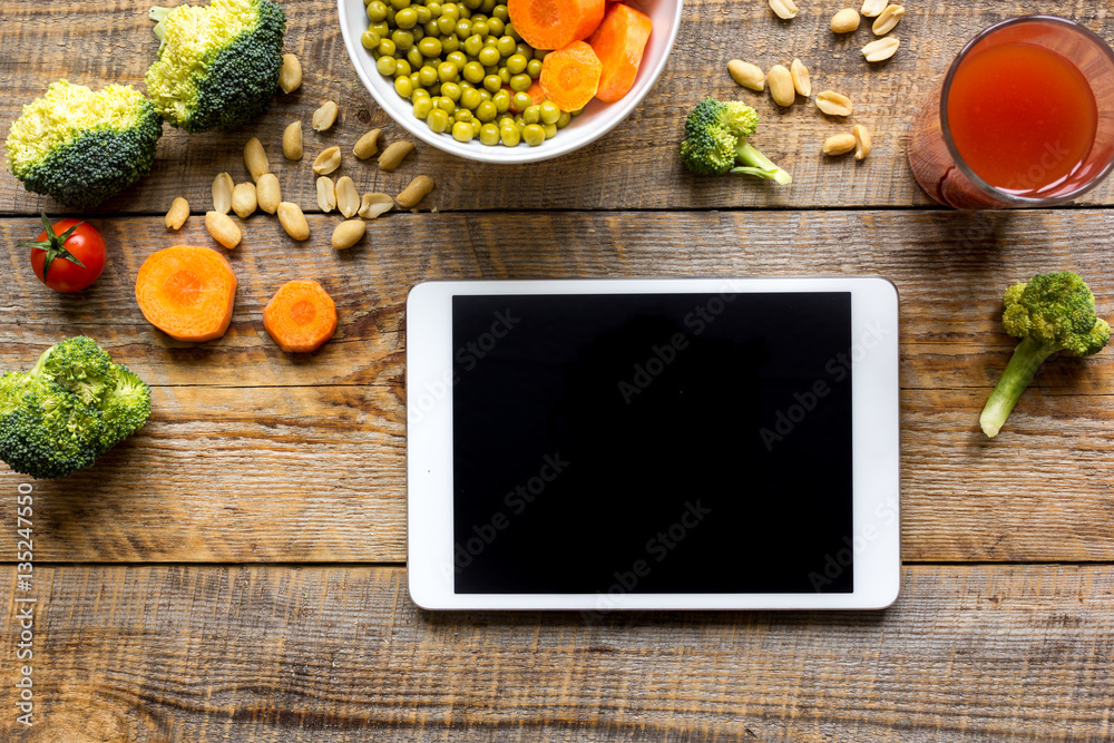 concept diet and tablet with vegetables mock up