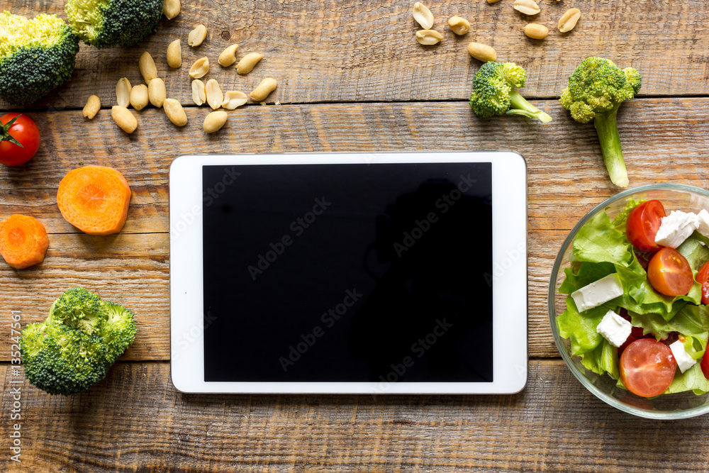 concept diet and tablet with vegetables mock up