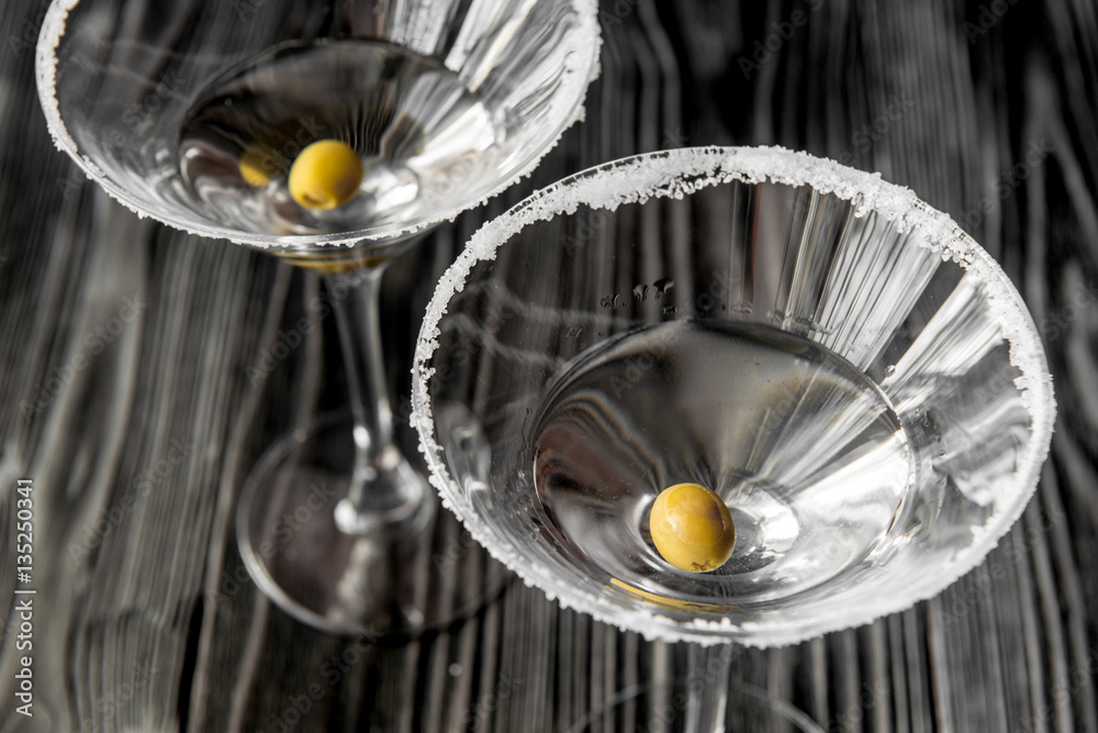 martini cocktail at wooden background close up