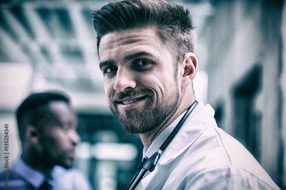 Smiling doctor in hospital