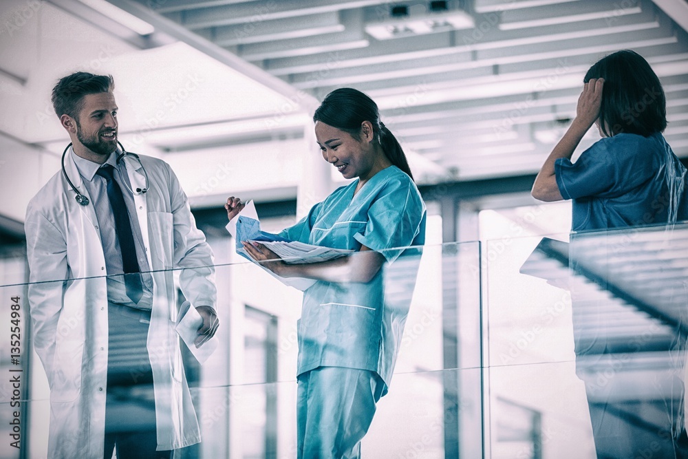 Doctor discusing with nurses