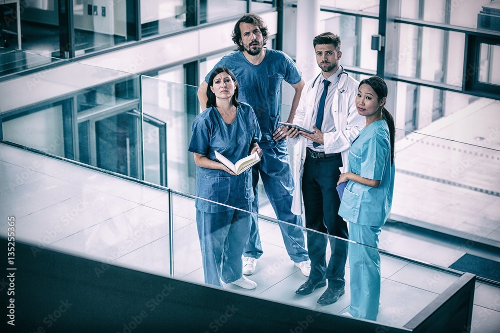 Doctor and nurse standing in hospital