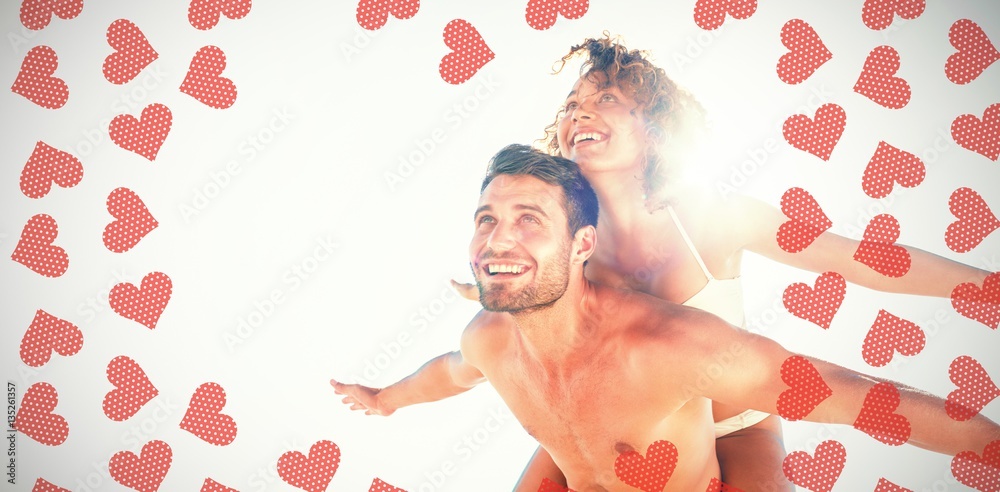 Composite image of happy couple smiling