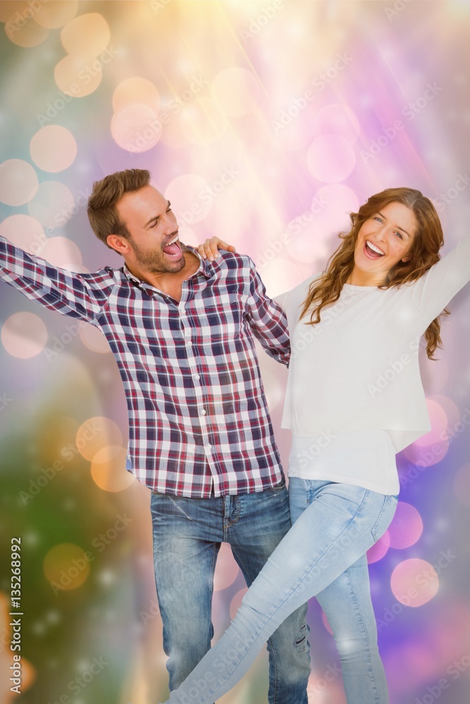 Composite image of young couple embracing and posing