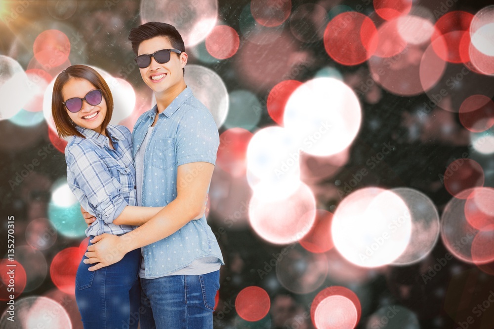 Composite image of portrait of happy couple standing