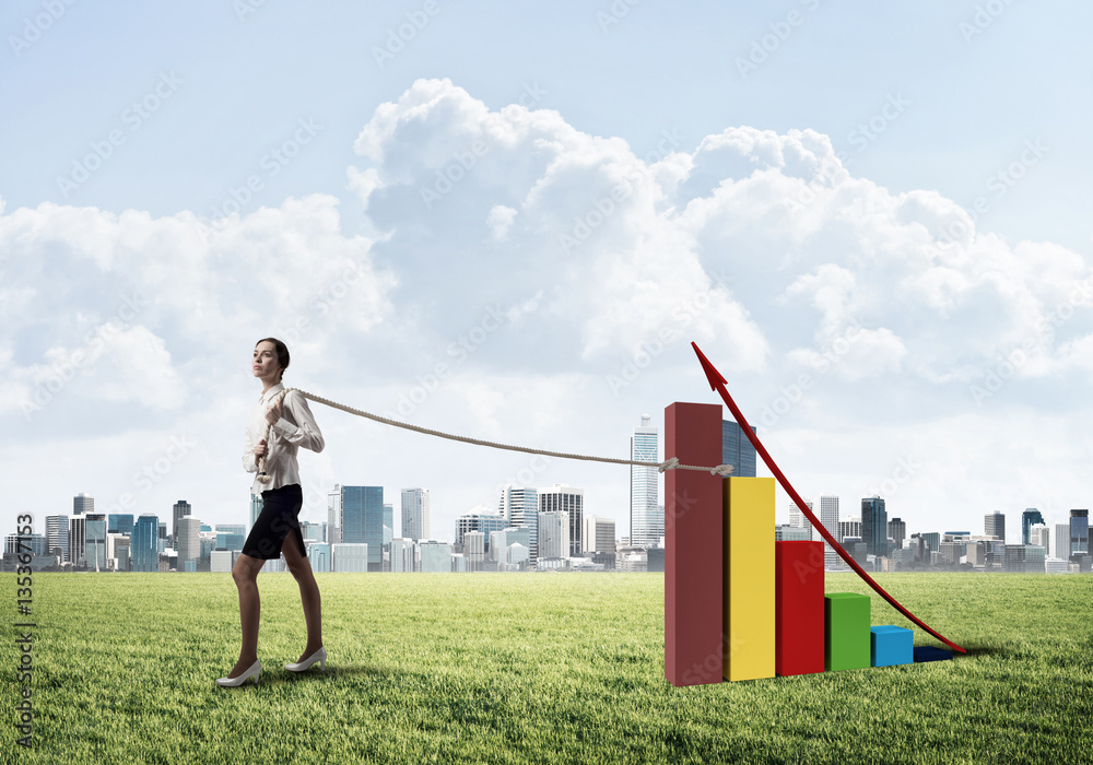 Businesswoman pulling arrow with rope and making it raise up