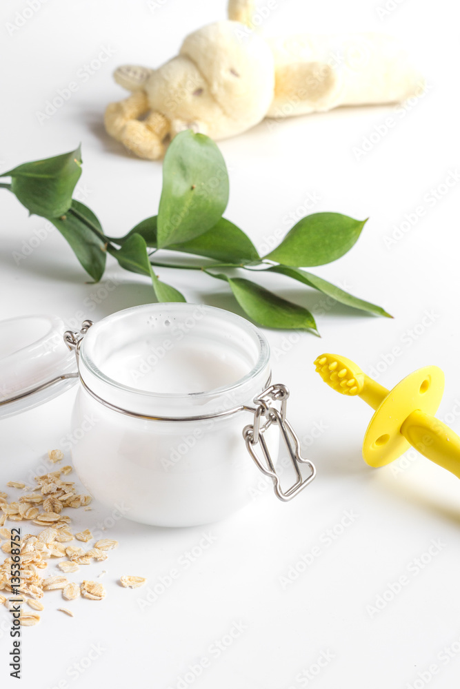 natural organic cosmetics with herbs for baby on white background