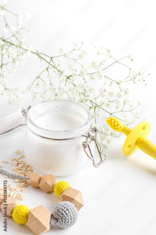 natural organic cosmetics with herbs for baby on white background