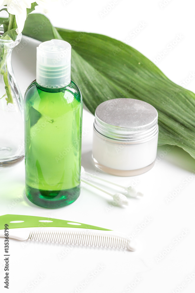 natural organic cosmetics with herbs for baby on white background