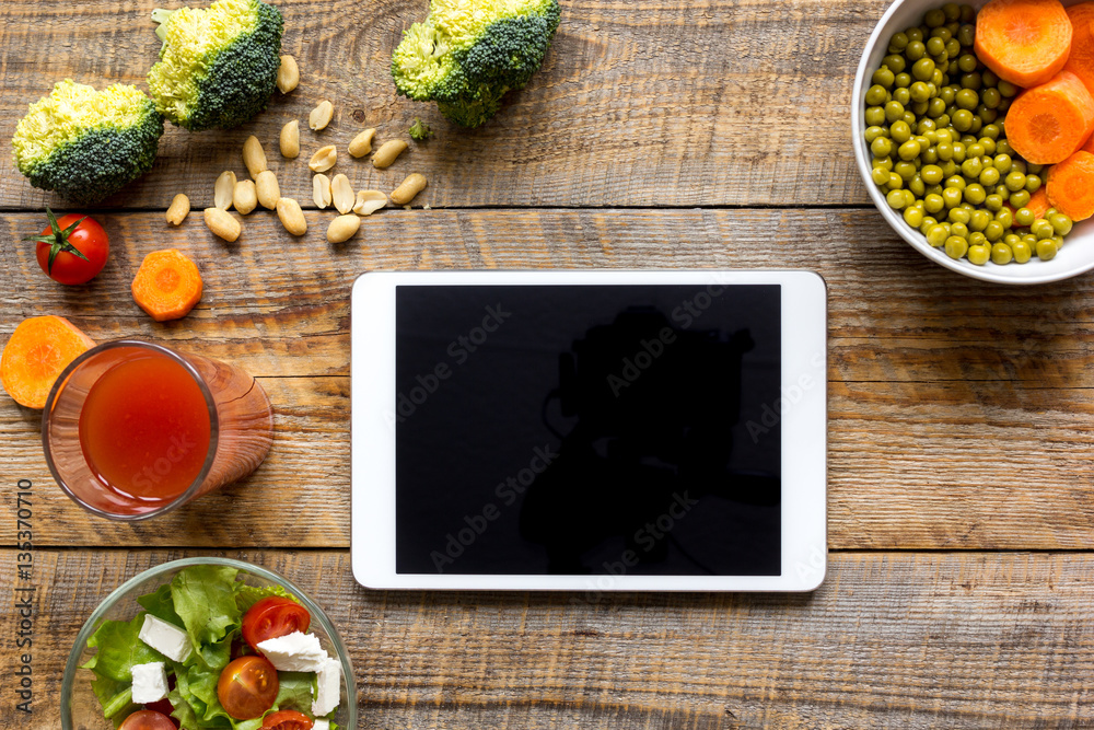 concept diet and tablet with vegetables mock up