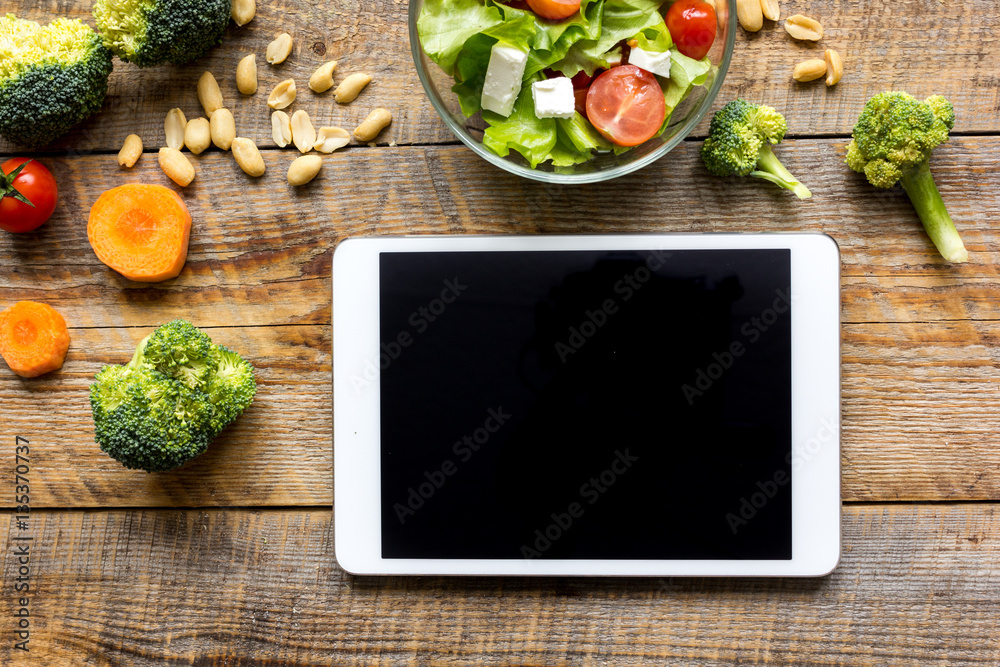 concept diet and tablet with vegetables mock up