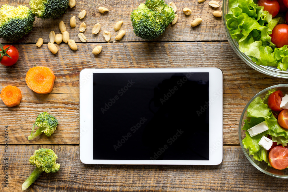 concept diet and tablet with vegetables mock up