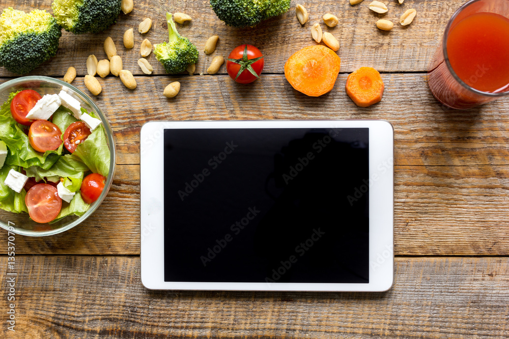 concept diet and tablet with vegetables mock up