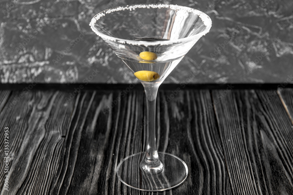 martini cocktail at wooden background close up