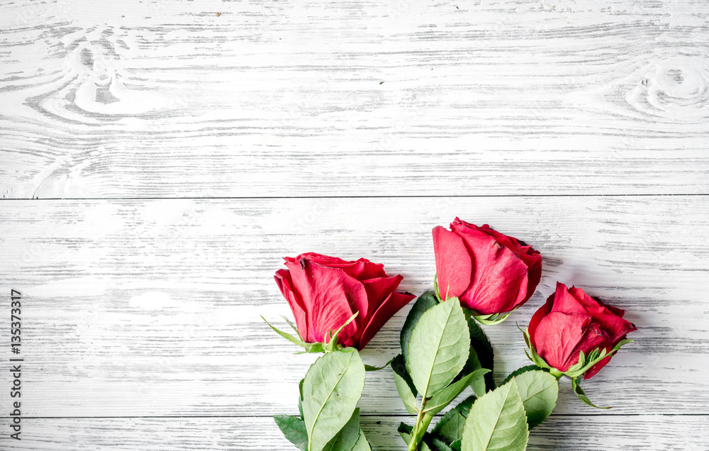 concept Valentines Day with flower wooden background top view