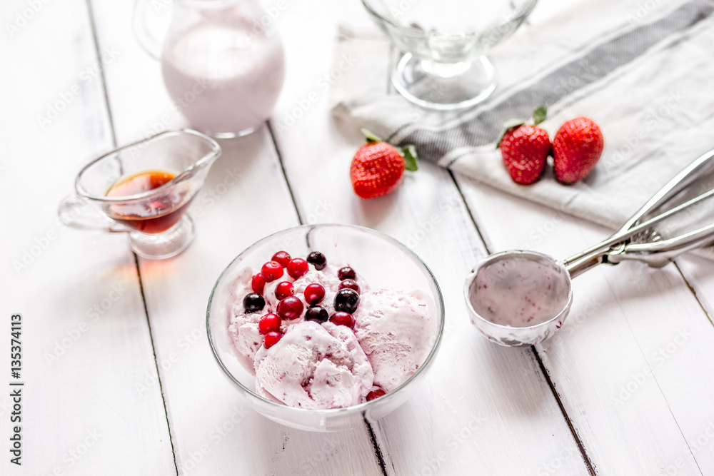 organic homemade ice cream in glass bowl on wooden background