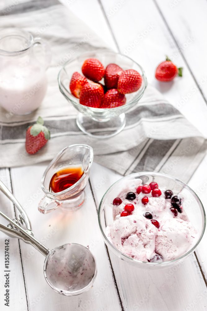 organic homemade ice cream in glass bowl on wooden background