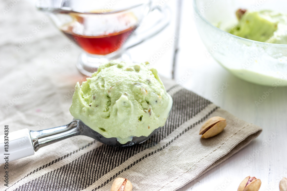 organic homemade ice cream in glass bowl on wooden background