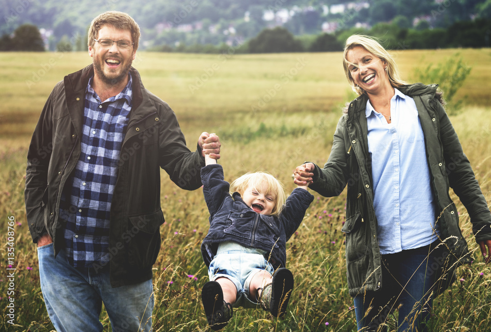 Family Parents Holding Hands Boy Swinging Concept