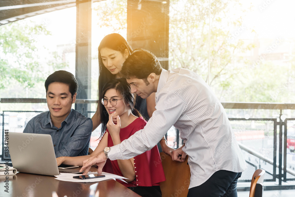 4 people meeting in coffee shop, business casual conceptual