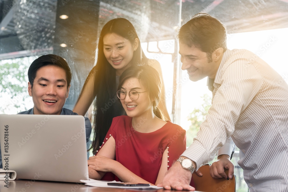 4 people meeting in coffee shop, business casual conceptual