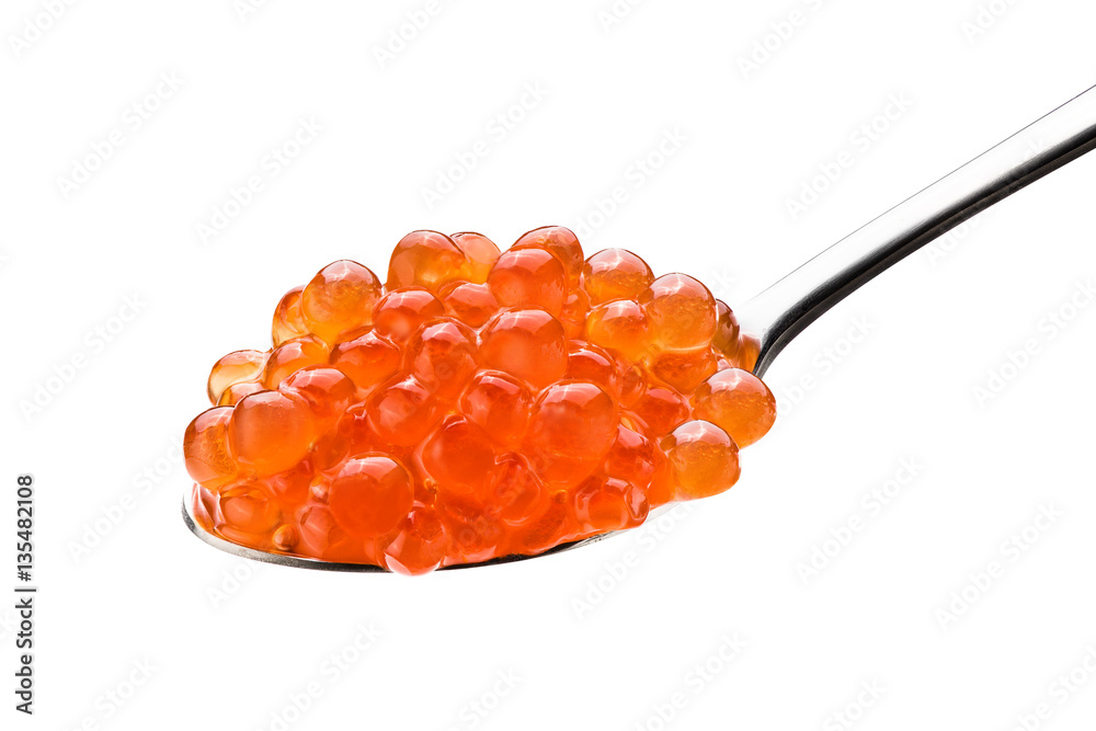 Red caviar in the silver spoon isolated on a white background with clipping path. Close up. Macro.