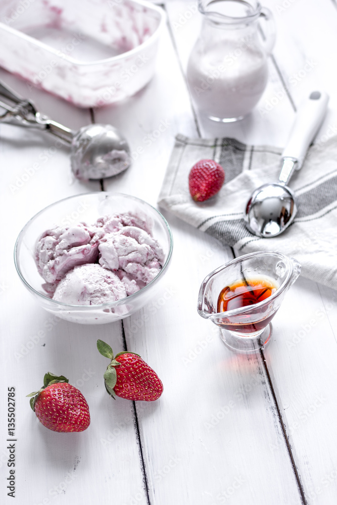 organic homemade ice cream in glass bowl on wooden background