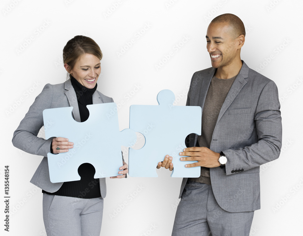 Business People Smiling Happiness Holding Jigsaw Puzzle Concept