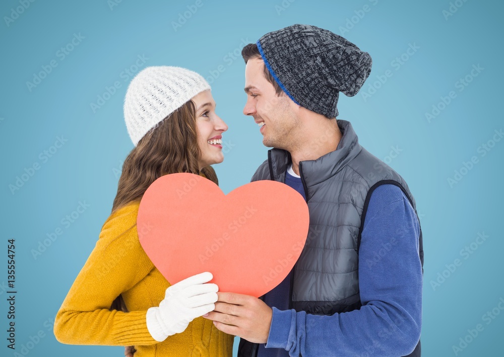 Romantic couple holding heart shape