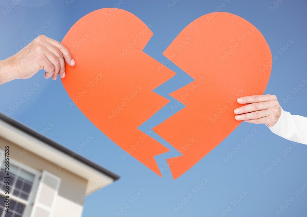 Couple holding a broken heart