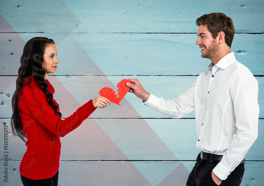 Couple holding a broken heart