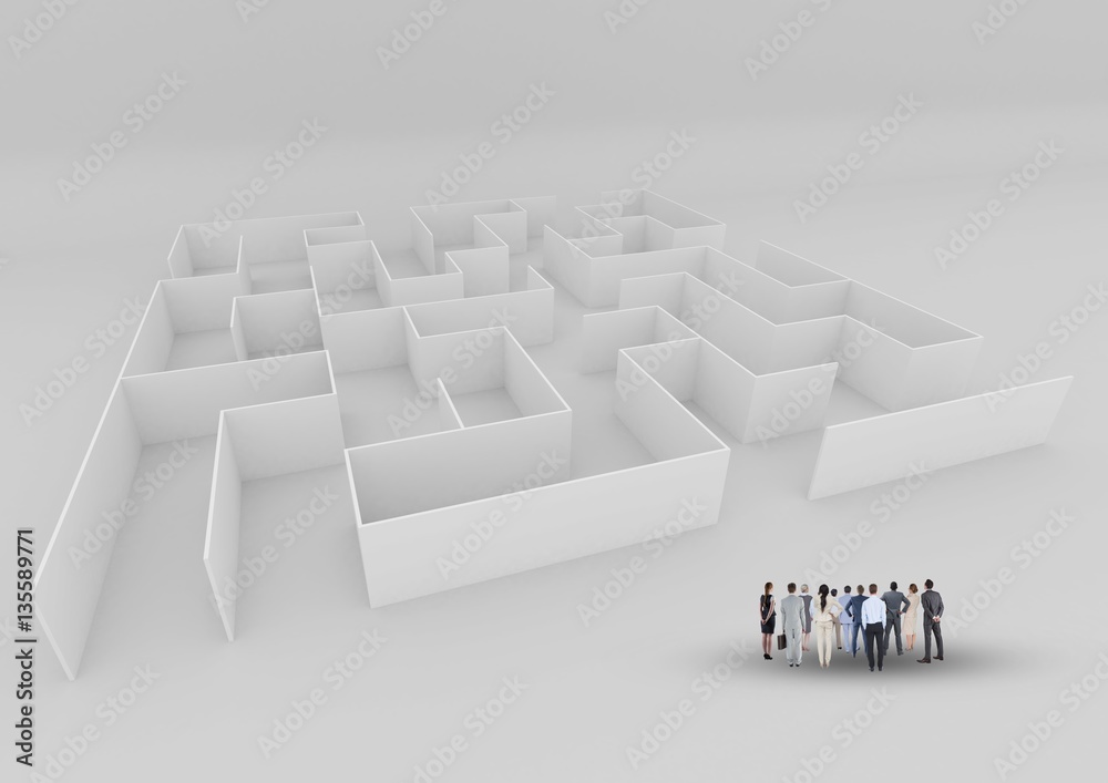 Businesspeople standing at the entrance of maze