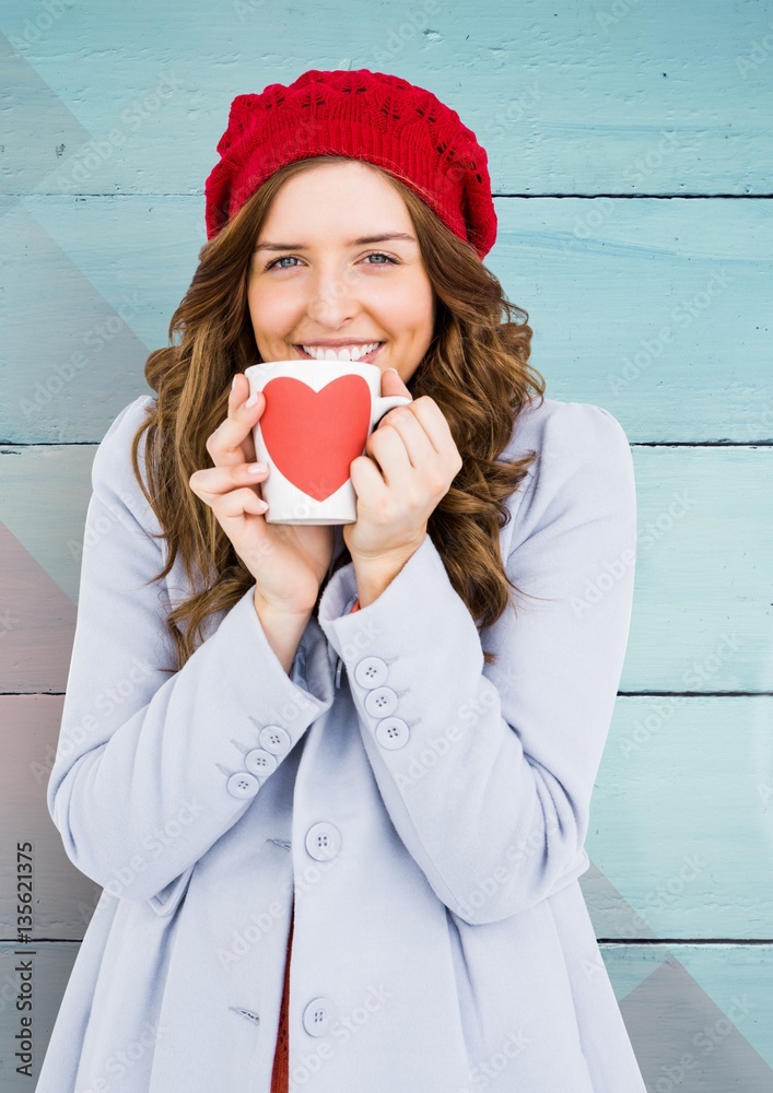 Portrait of beautiful woman having a cup of coffee