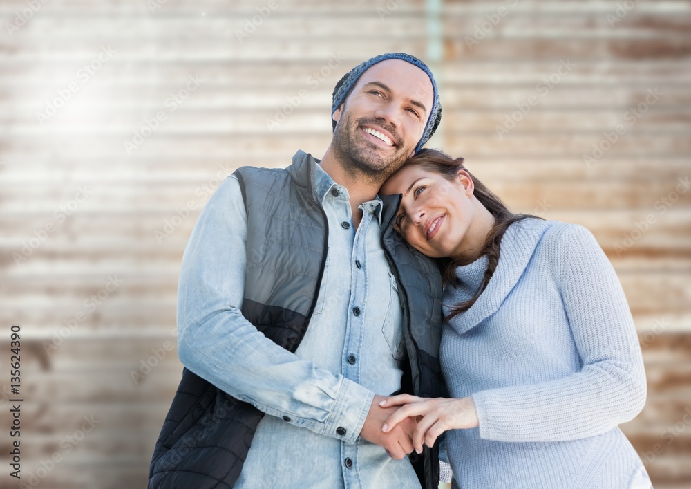 Portrait of happy couple embracing