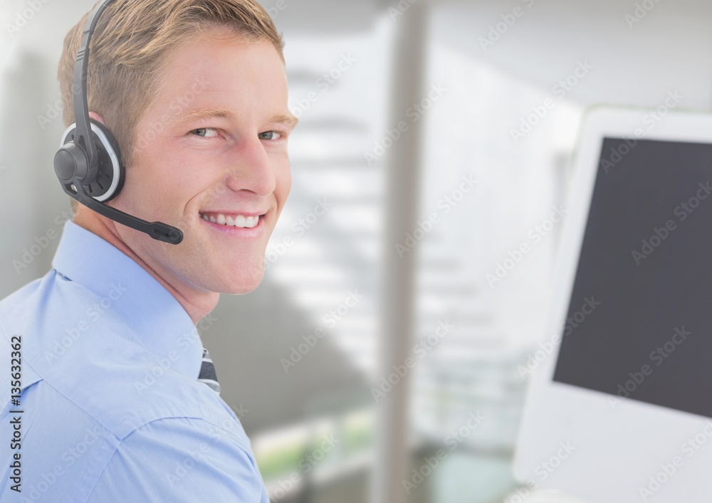 Portrait of smiling businessman with headset