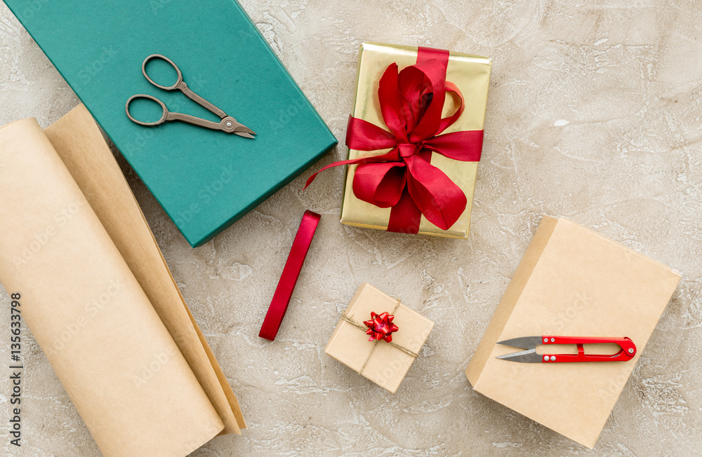 wrapping gifts in box for holiday top view mock up