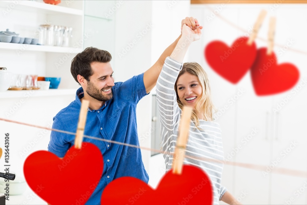 Romantic couple dancing at home