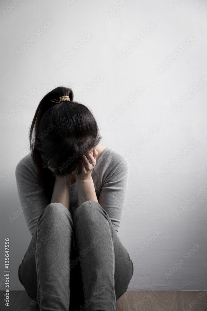 depression woman sit on floor