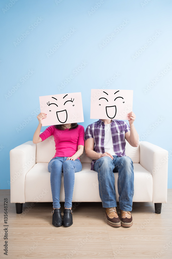 couple hold billboard