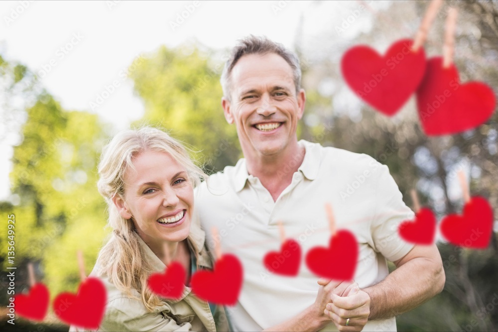 Composite image of romantic couple enjoying together