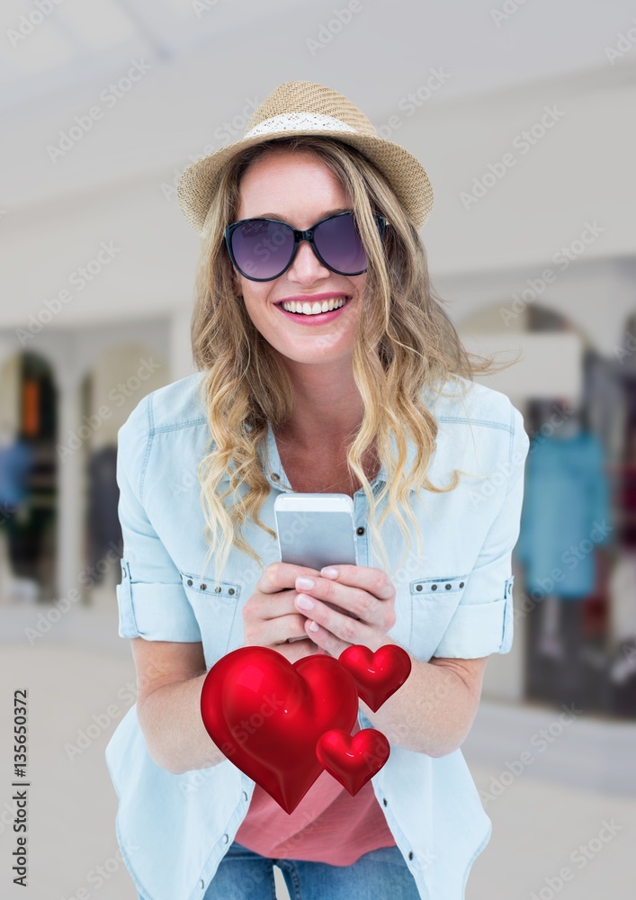 Happy woman text messaging on mobile phone